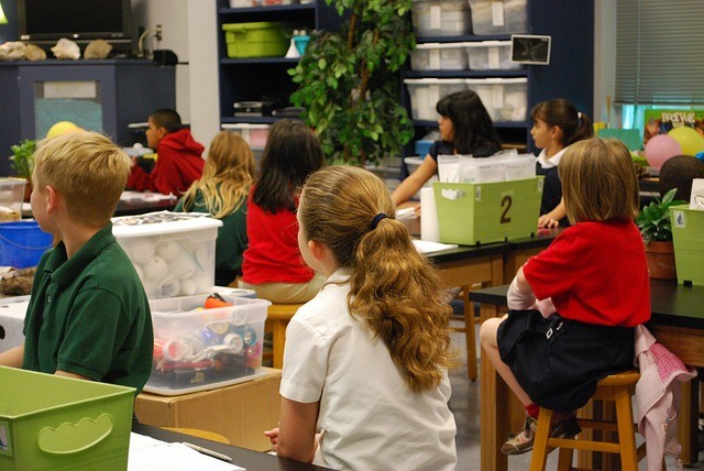 Students engaged in a science class.